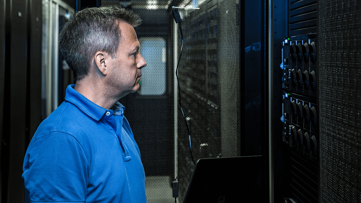 Man inspecting servers